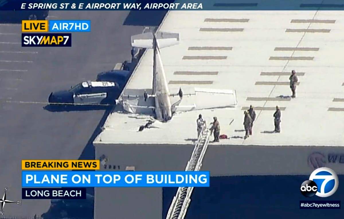 Pilot escapes with minor injuries when small plane crashes into hangar's roof at California airport