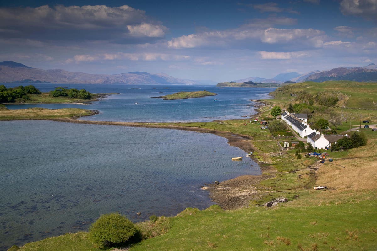 Four left clinging to upturned hull after dinghy capsizes during fishing trip