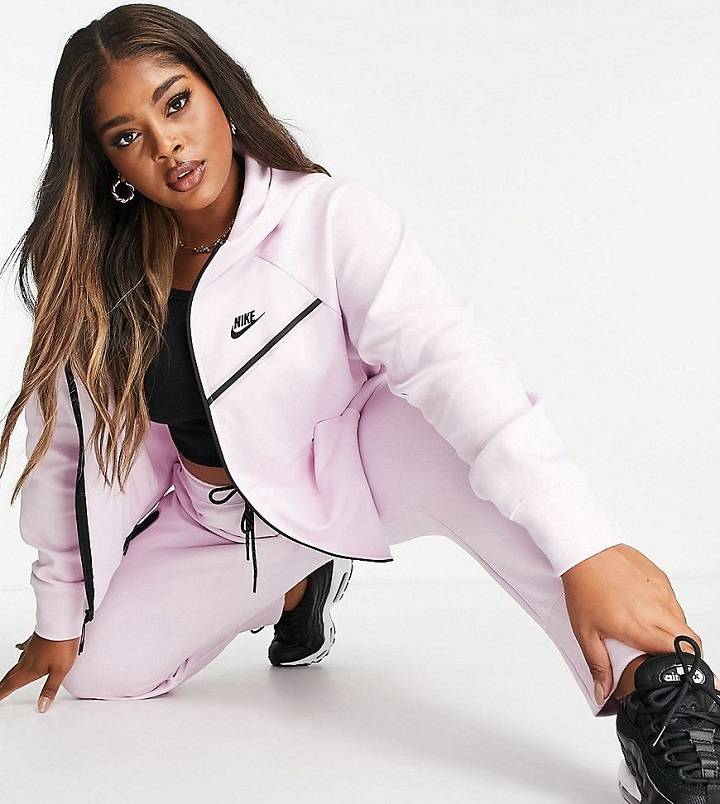 Pink Nike Tech - Embracing Style and Performance in Athletic Gear