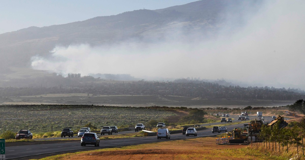 Hawaii wildfires burn homes, forcing evacuations as strong winds hamper response