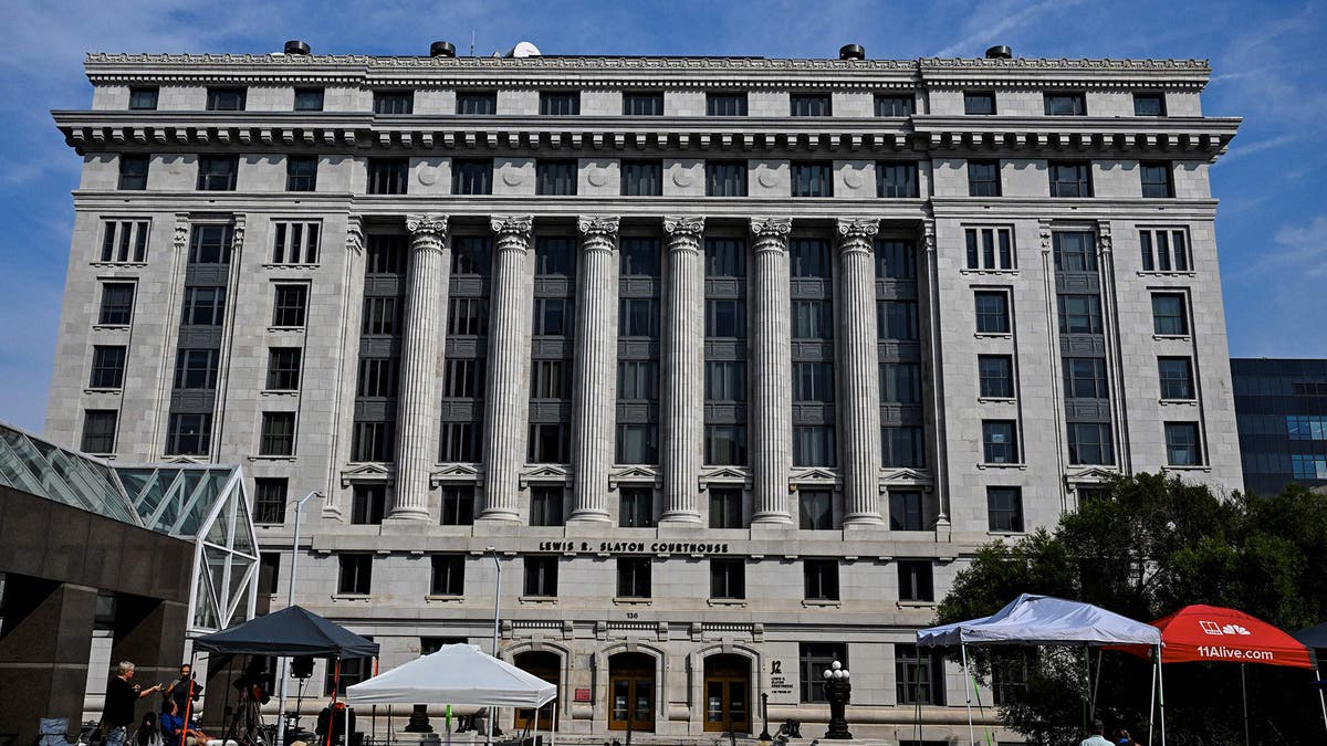 Watch: Live outside Georgia jail where Trump expected to be booked