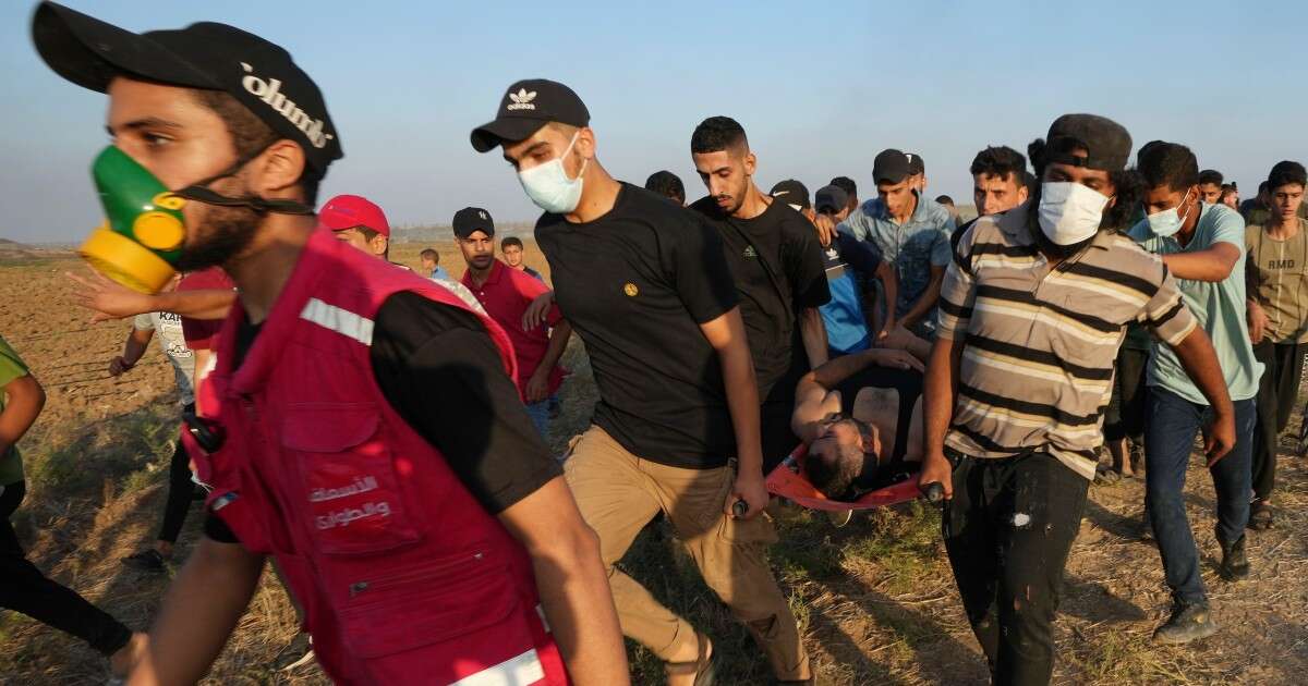Israel strikes Gaza after Palestinians in besieged strip launch incendiary balloons