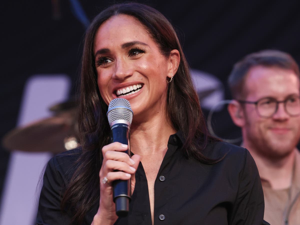 Meghan Markle apologises for being late as she joins Harry at Invictus Games