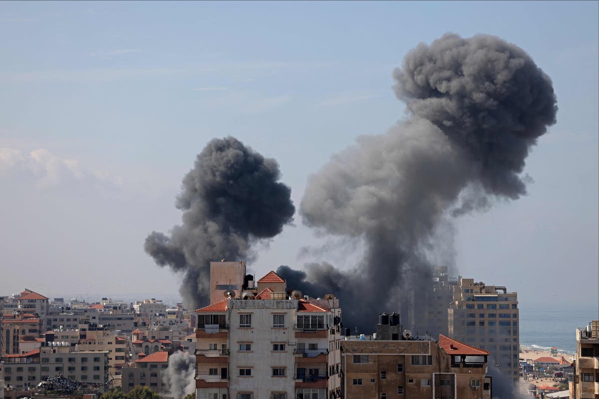 War alert declared as Hamas fires thousands of rockets into Israel – latest