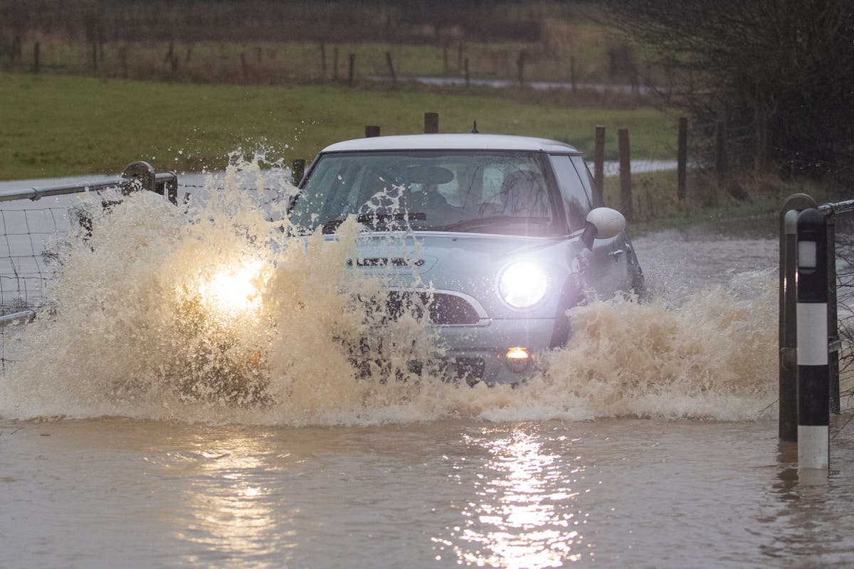 Downpours continue across flooded Scotland while the south enjoys sunny skies