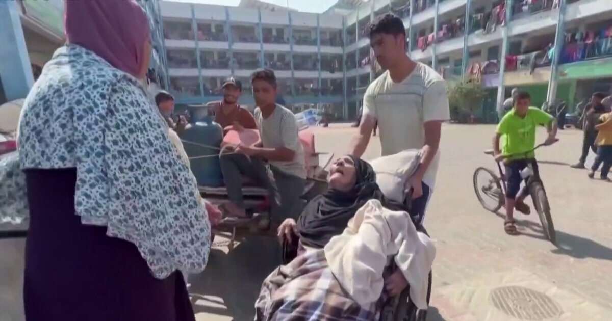 Tens of thousands of Palestinians reportedly shelter in Gaza City hospital