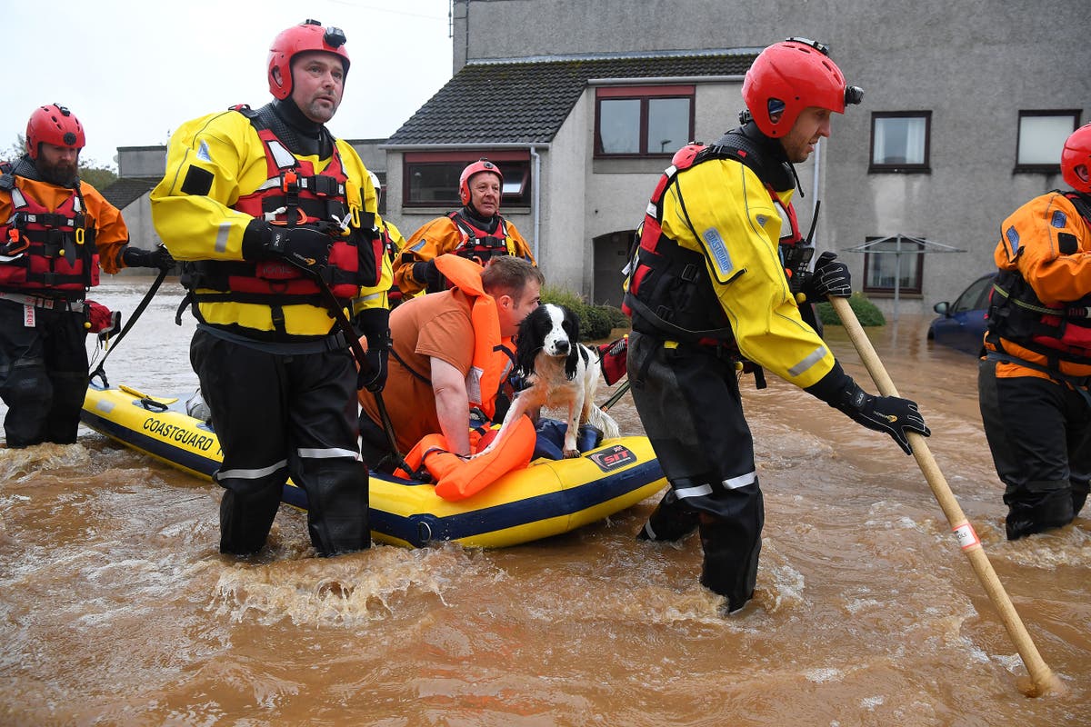 Storm Babet: Trapped residents airlifted from homes as flood waters rise - live
