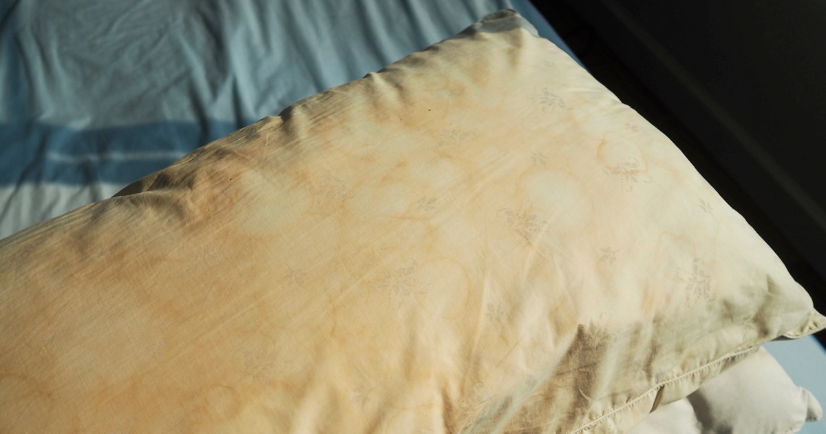 People are divided online over whether it’s gross to sleep on stained, yellowing pillows
