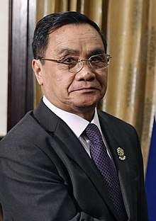 Thongsing Thammavong Biography, Age, Height, Wife, Net Worth and Family