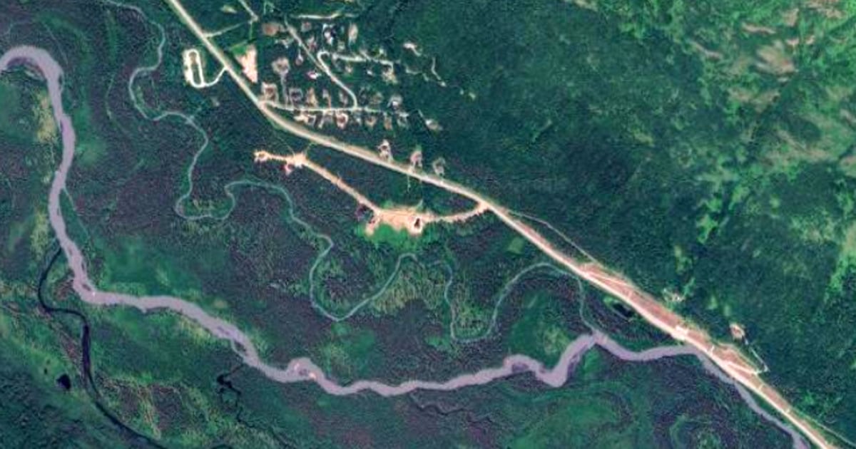 Woman missing after going under river ice trying to save her dog in Alaska