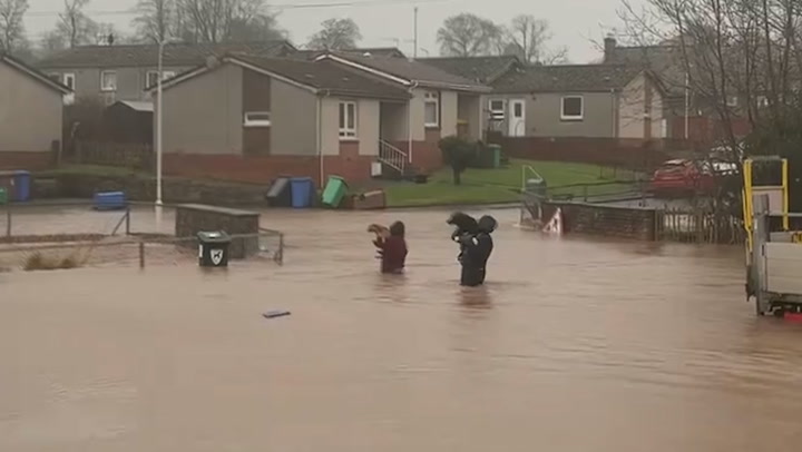 Dogs Carried To Safety As Storm Gerrit Forces Residents To Evacuate Scottish Town