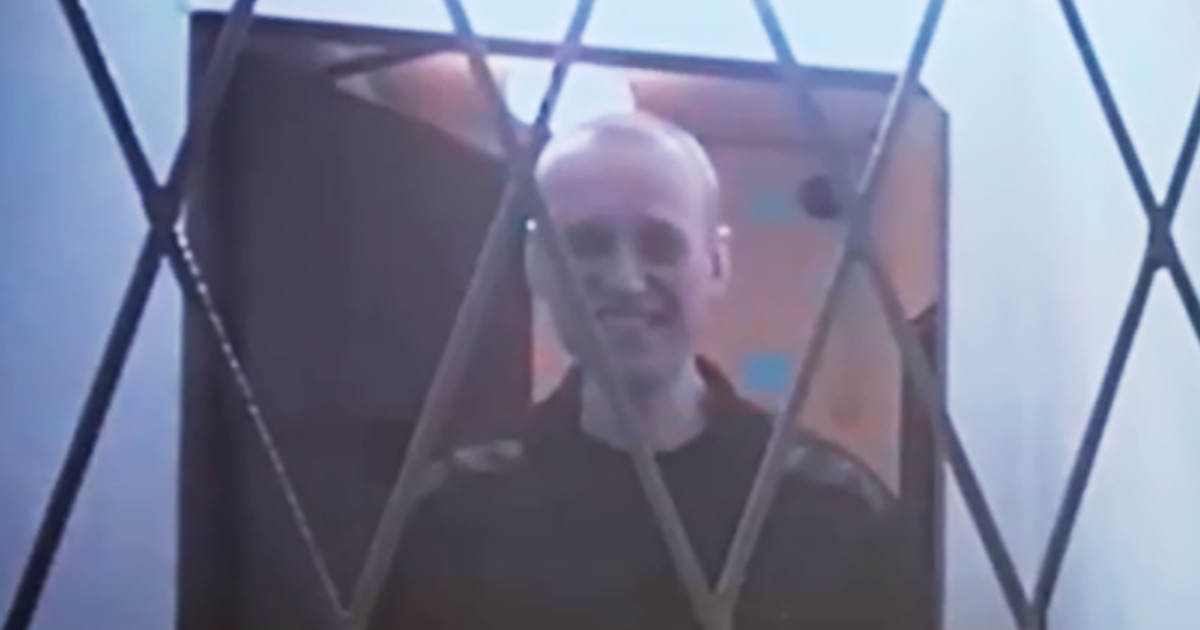 Russia’s Navalny jokes about ‘naked party’ in first video link from new prison