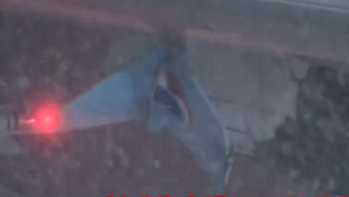 Passenger plane damaged as two aircraft collide on Japan runway