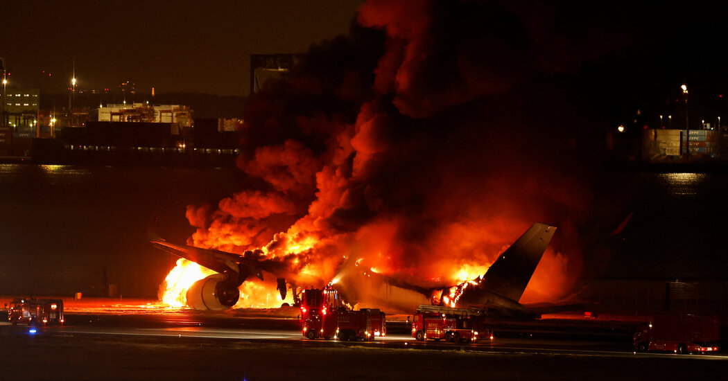 Plane Explodes in Flames While Landing at Airport in Tokyo