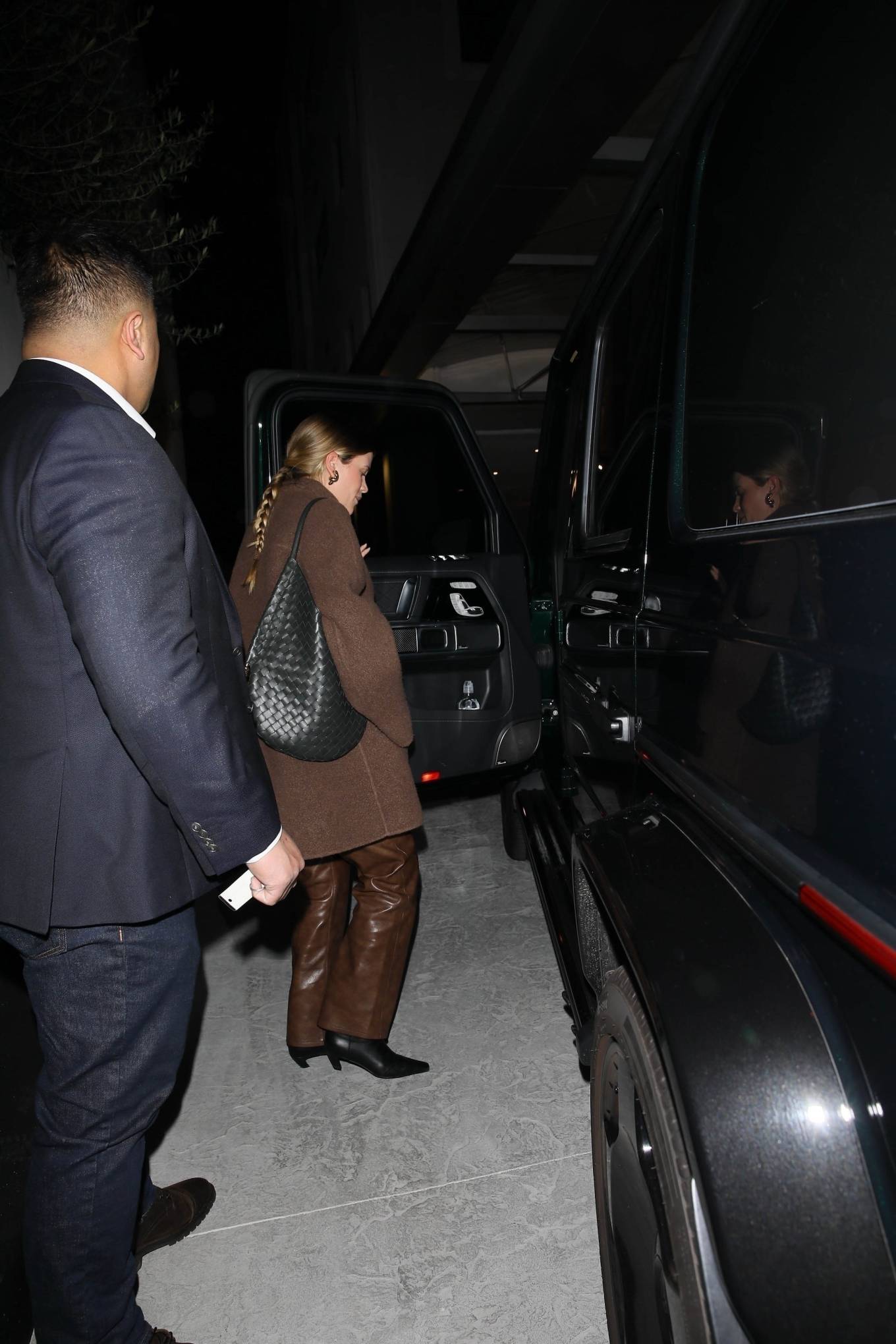 Sofia Richie – Wearing a large coat to dinner with friends in Beverly Hills