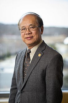 William Ka Ming Lau Biography, Age, Height, Wife, Net Worth and Family