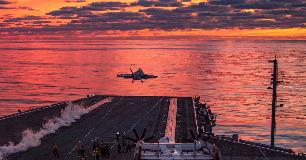 Onboard a U.S. aircraft carrier, a cat-and-mouse game with Houthi forces plays out