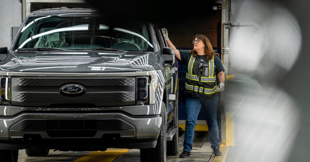 As electric vehicle demand slows, workers caught in the middle face an uncertain future