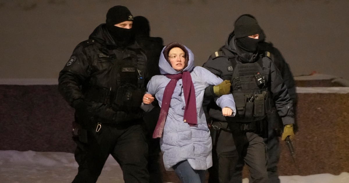 Floral tributes to opposition leader Alexei Navalny pulled down and mourners detained in Russian cities