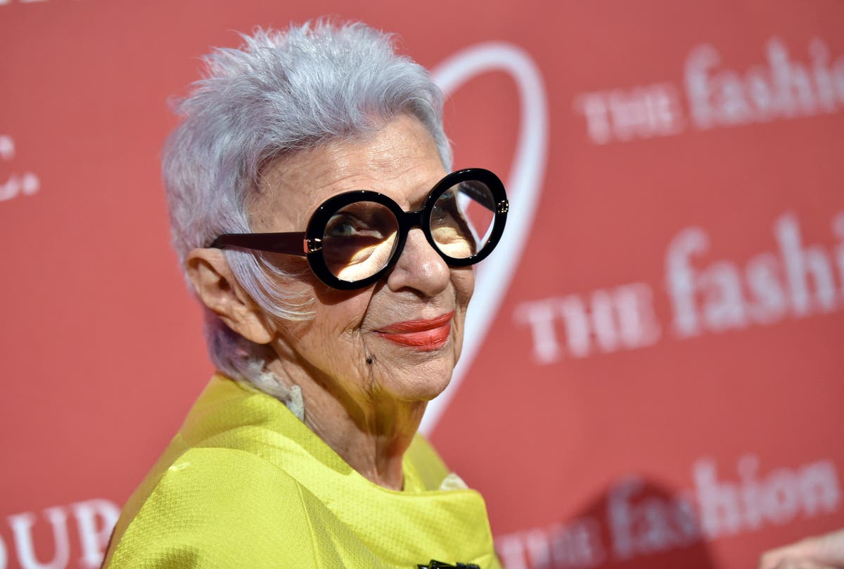 Iris Apfel, fashion icon known for her eye-catching style, dies at 102