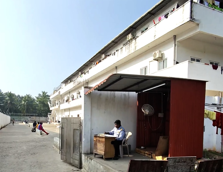 A uniformed security guard stationed at a Choice Canning shrimp processing plant in Amalapuram, India.
