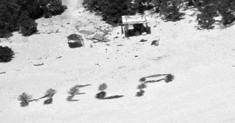 Stranded sailors rescued from tiny Pacific island after making 'HELP' sign with leaves